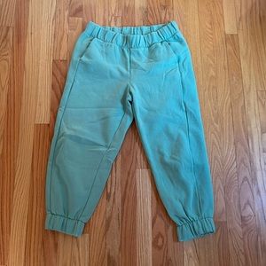 Green joggers size M